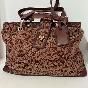 Diane Von Furstenberg (DVF) weekender or travel bag.